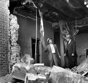 Atlanta Police examine the destruction of the Temple bombing in Atlanta in October 1958.